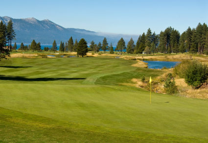 A golf course overlooks the shore of Lake Tahoe.