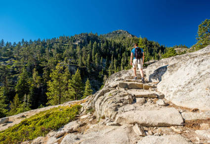 A person hiking on one of Lake Tahoe’s many trails