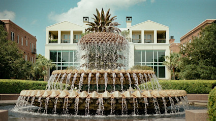 Pineapple Fountain at dusk sets the tone for evening tours and post-dinner strolls during Halloween weekend in Charleston.