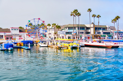 A festive waterfront scene in Newport Beach, visually echoing the vibrant energy of the film festival and its community gatherings.