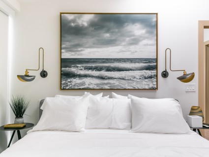bedroom with ocean picture