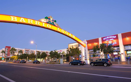 A photo shows a street view of Barrio Logan, one of the best neighborhoods in San Diego.