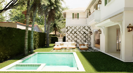 Private backyard pool and spa surrounded by manicured lawn, palm trees, and an outdoor lounge area.