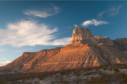 A striking image of the Guadalupe Mountains serves as the backdrop of Texas mountain getaways.