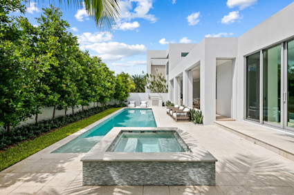 Seagate in Palm Beach County offers a saltwater pool, spa and quick beach access, illustrating seamless indoor outdoor coastal living.