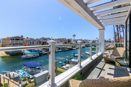 Bayside in Newport Beach features a private dock and rooftop deck, ideal for post beach evenings on the harbor.