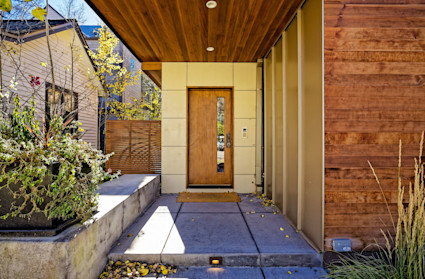 Aspen Grove's welcoming entry and outdoor living areas illustrate how a well-placed drop zone supports active days near the lifts and downtown.