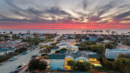 Aerial sunset view over La Jolla capturing the elegant, vibrant mood that surrounds the concours d'elegance la jolla.