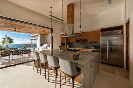 Palmilla’s modern kitchen with water views supports wellness through thoughtful cooking, prep and post-training nutrition.