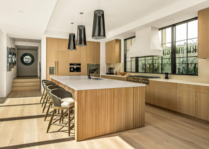 Pacific Place offers a standout kitchen and flexible living areas, ideal for hosting curated tasting menus and private wine events in Newport Beach.