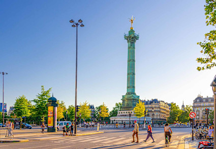 A stock photo shows Place de la Bastille.
