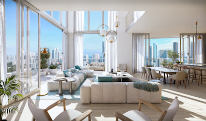 Bright penthouse living and dining area with cream sectional, teal accents, gold pendants, and panoramic floor-to-ceiling city views.