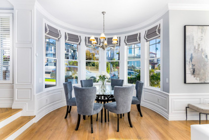 The sun-drenched dining room at Ocean Boulevard evokes the welcoming ambiance and sophisticated gatherings that define both the Pacific Wine and Food Classic and Newport Beach living.