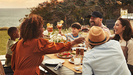 Two families enjoy time in their second home