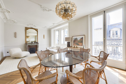 Rue Madame in the 6th arrondissement unites Left Bank charm with sophisticated finishes, including restored moldings, marble accents, and oversized windows that bathe spaces in natural light.
