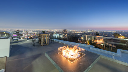 rooftop deck with firepit and views of LA
