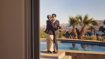 Older couple dancing together in their second home