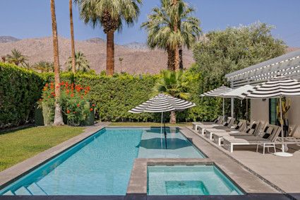 Bacana features a stunning pool, mountain views, and private outdoor spaces, capturing the essence of Palm Springs golf community living.