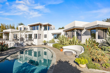 luxurious poolside patio with panoramic coastal views at 1131 Las Alturas Rd, Santa Barbara, CA 93103, exemplifying upscale living in a vibrant coastal destination