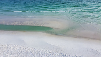 30A’s sugar-white sand and turquoise water reflect the calm, clean setting that defines Gulf Coast living.