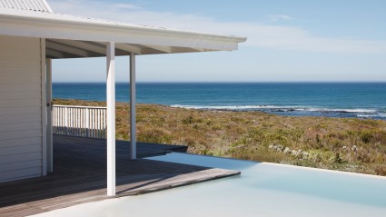 Beach house and infinity pool overlooking ocean