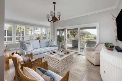 Palmetto Cove’s sunroom and open plan design show how Kiawah’s luxury homes create inviting spaces to enjoy the coastal scenery, with direct access to the beach and upscale club amenities.