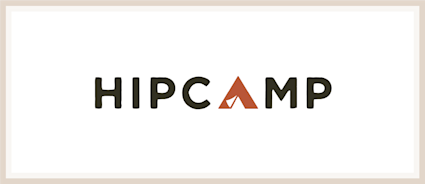 A logo of Hipcamp, one of the many Plum Guide alternatives.