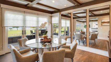 Dining room with large mirrors