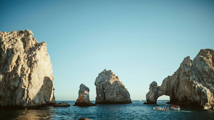 El Arco in Cabo, Mexico, reinforcing Los Cabos as an iconic global destination and explaining why international ownership planning differs from US beach markets.