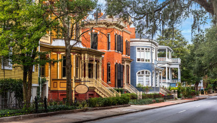 Cozy houses line the streets of Savannah, one of the best vacation spots for couples.