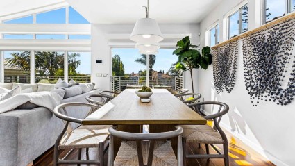 Contemporary dining area with panoramic window view