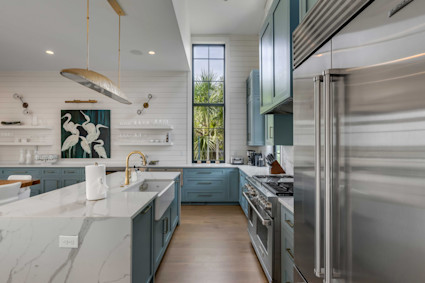 Victory Bay’s professional-grade kitchen and bright living spaces set the stage for relaxed post-round gatherings.