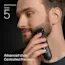 Young man trimming his beard on the side of his face with the Braun Beard Trimmer Series 5