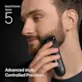 Young man trimming his beard on the side of his face with the Braun Beard Trimmer Series 5