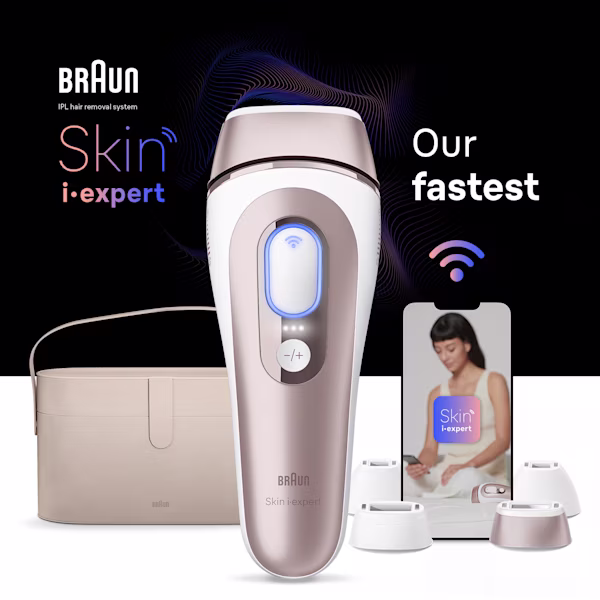 Centered IPL device, behind it a beige vanity pouch, a mobile device with Skin-i-Expert app and four attachments Centered IPL device, behind it a beige vanity pouch, a mobile device with Skin-i-Expert app and four attachments