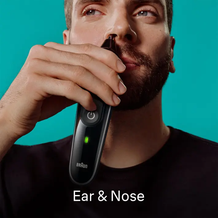 Man using product on nose