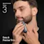 Young man trimming the beard on his chin with the Braun Beard Trimmer Series 3