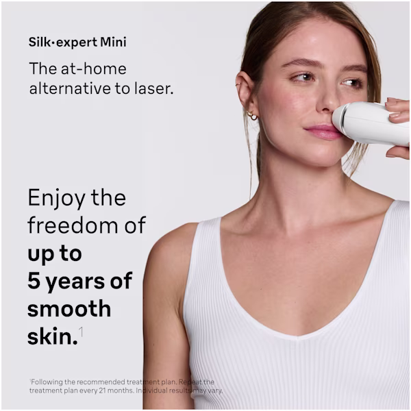 In use shot of a woman using the Braun Silk·expert Mini on her upper lip. In use shot of a woman using the Braun Silk·expert Mini on her upper lip.
