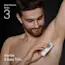 Young man effortlessly using the Braun Body Groomer Series 3 device to trim his armpit