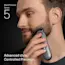 Young man trimming his beard on the side of his face with the Braun Beard Trimmer Series 5