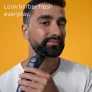 Man using product on beard