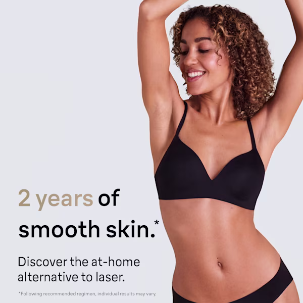 A woman enjoying her smooth skin after having used Braun Silk·expert Pro 5