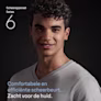 Een lachende man met een geschoren gezicht. Tekst zegt: Comfortabele en efficiënte scheerbeurt.