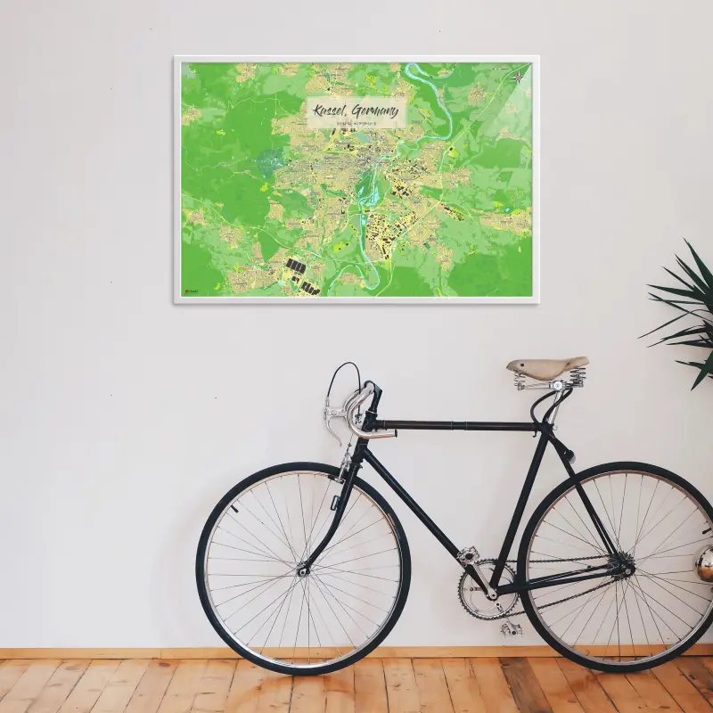 Kassel-Stadtkarte als Poster im Jalma Design in einer Wohnung mit einem Fahrrad an der Wand