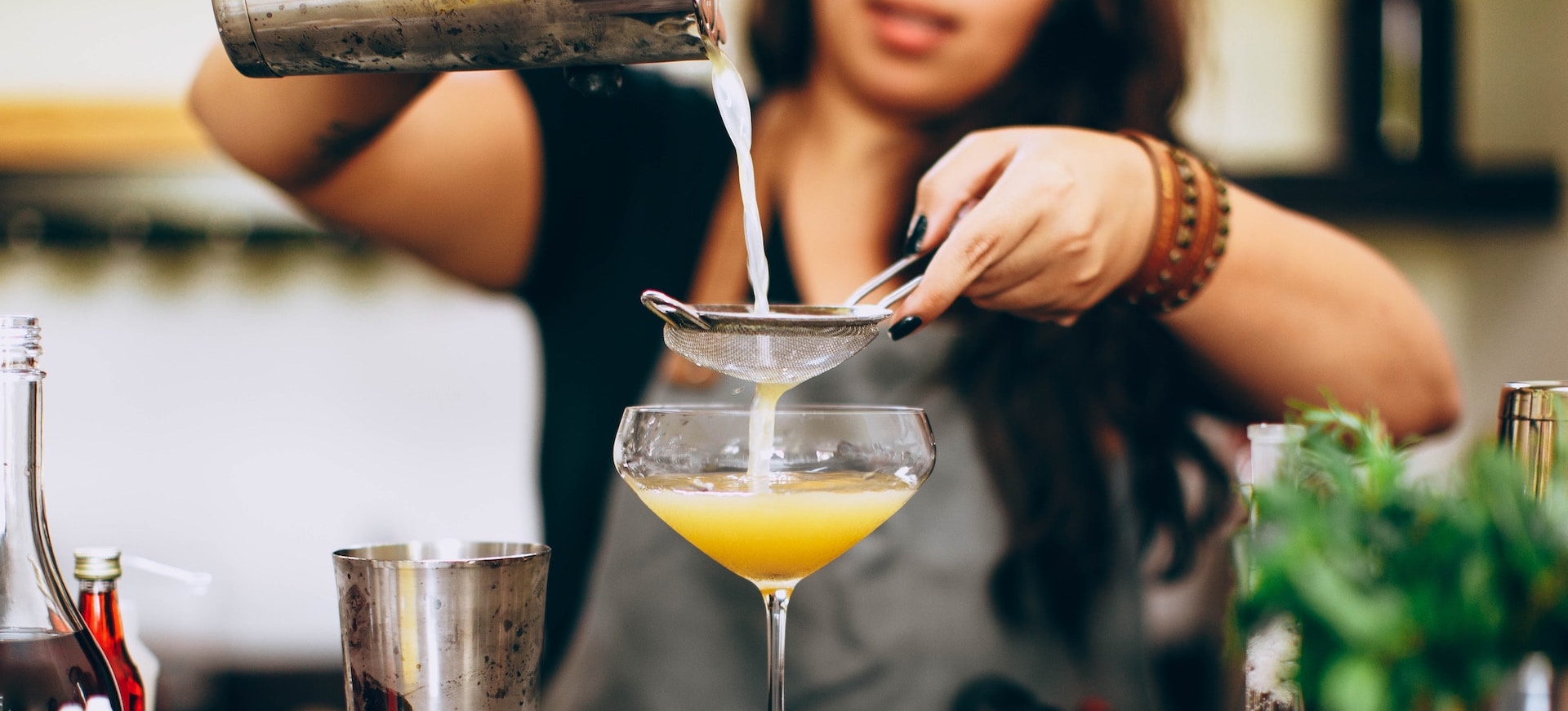 barback-making-a-cocktail-at-restaurant