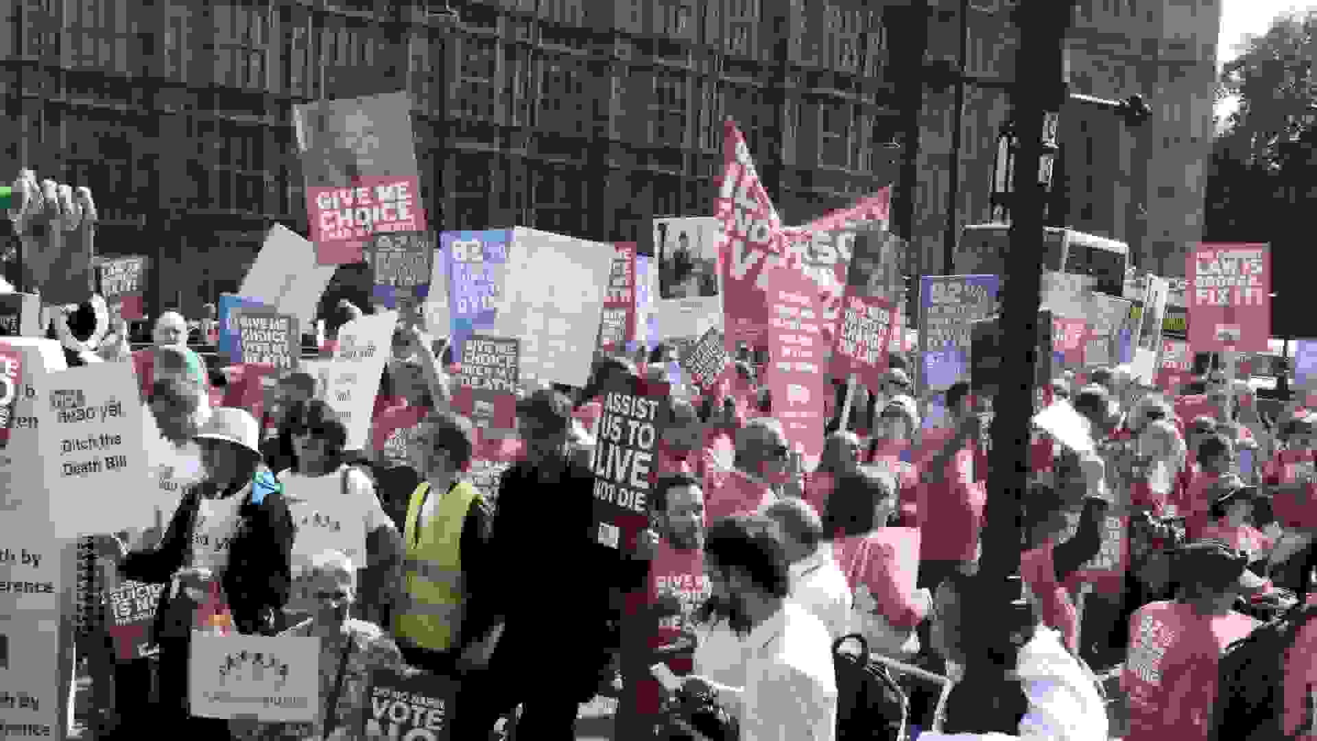 Supporters and opponents of assisted dying bill protesting outside the Palace of Westminster. © Rights Ltd / Alamy Stock Photo