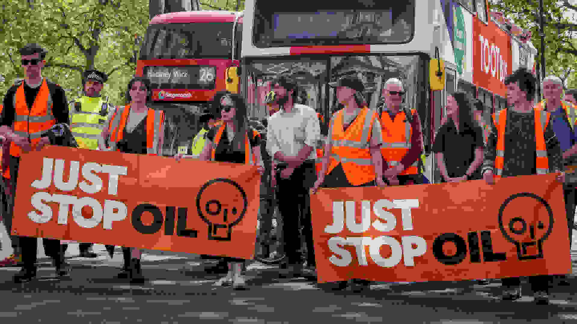 Just Stop Oil activists, Whitehall. ©Alisdare Hickson (CC BY-SA 2.0)