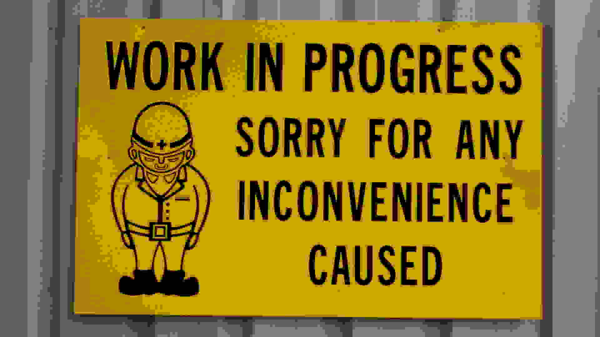 Construction site sign saying 'Work in progress'