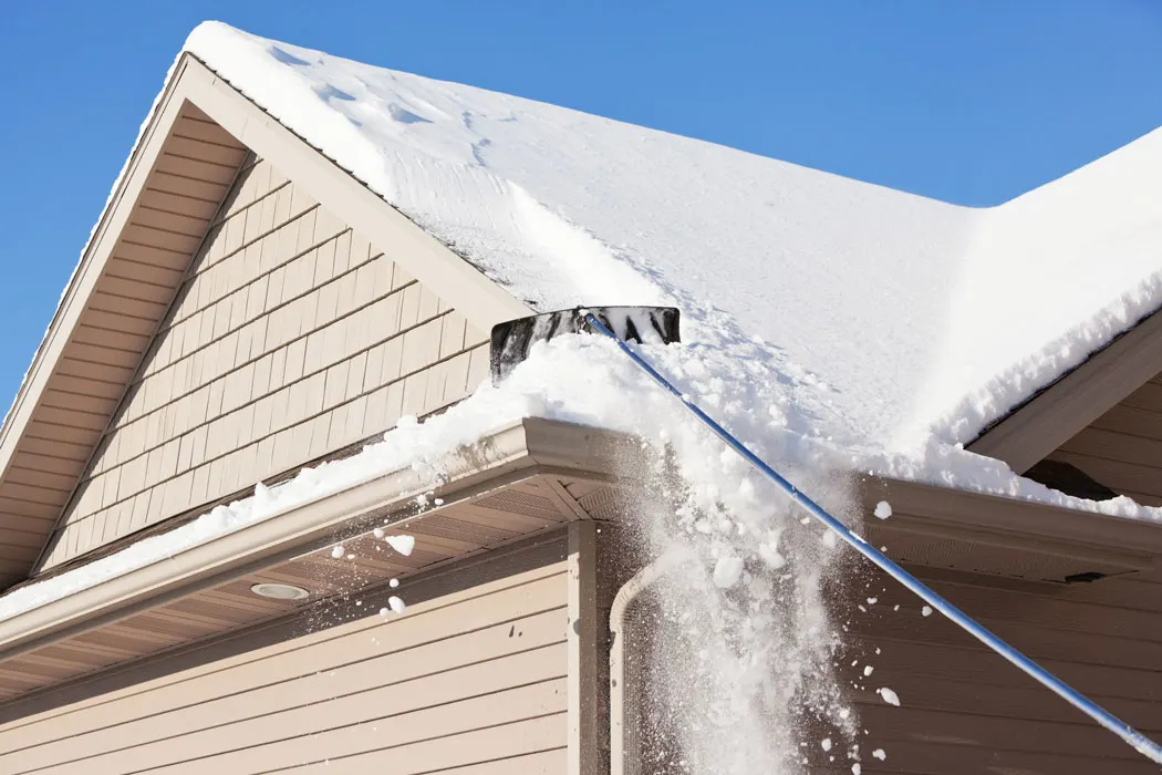 clearing snow off roof