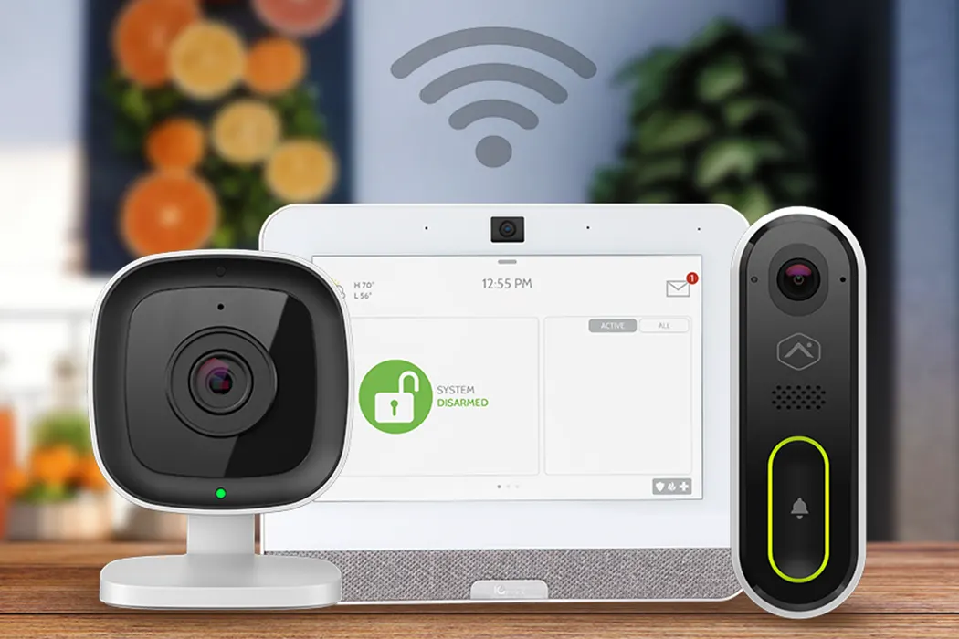 Brinks Home™ offers a variety of products which communicate using a combination of wireless signals. A few of the most popular items displayed here include the Alarm.com ADC-V523 Indoor Video Camera, the Qolsys IQ Panel 4 touchpad, and the Alarm.com ADC-VDB770 Video Doorbell.